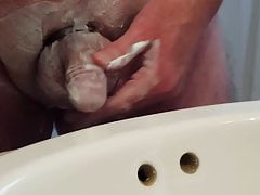 Shaving cock and balls.