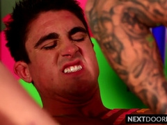 Three muscular homosexuals are licking and drilling asses