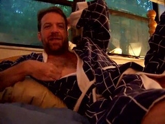 hairyartist joy in a blue checked bathrobe