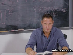 Classroom penis milking by naughty Asian coed