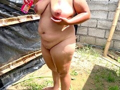 Exhibitionist Ecuadorian babe showers in public, touching her pussy and those huge natural tits