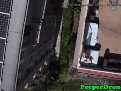 Rooftop lovemaking filmed by drone