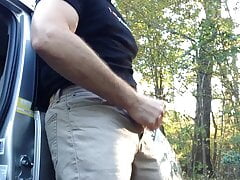 Jerking off outside by my car. I needed to stretch my cock.