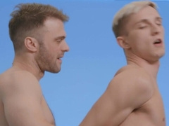 Appealing lovers get intimate on camera in seductive positions