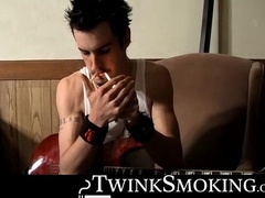 Straight rocker Axel plays his guitar and his throbbing cock with his pack of cigaret