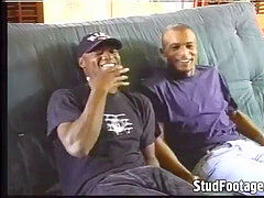 2 black folks plowing in the bed