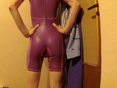 young boy in tight short swimsuit showing closer