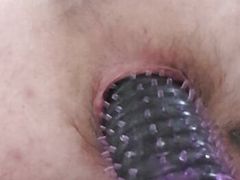 Anal sex vibrator with a spike