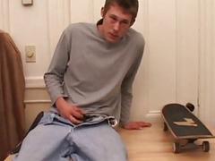 Horny jock Brent Stenson fucks his fist at the kitchen table