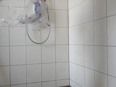 Pissing and wanking in rubber pants