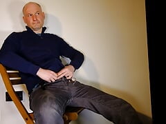 Man wanking as he strips naked for you to see his uncut shaved cock soft and erect