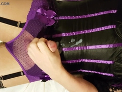 Crossdresser jacks and finishes off dressed in satin harness sheer underpants and tights