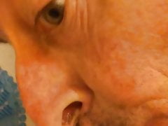 Faggot eating more cum from a public urinal