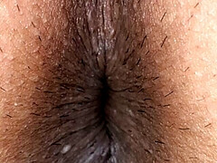 Ass and anus of a man wearing women's underwear