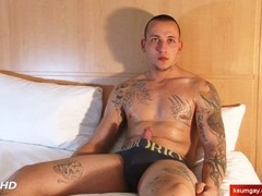 Handsome gay men enjoying mutual masturbation