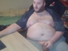 Chubby middle-aged gay guy Korus enjoying himself in a bear-themed session