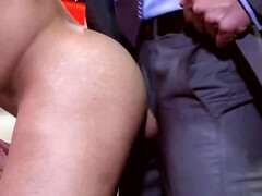 Man in a suit fucking a male stripper in the empty club