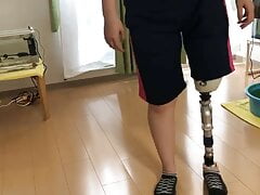 Japanese SAK amputee girl walking with prosthesis