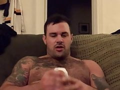 Hairy tatted stud has fun with vibrating pocket masturbator