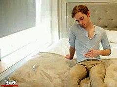 Skyler finger-fucks himself as he milks his large uncut hard-on
