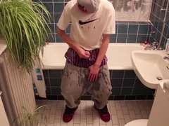 Young stud lets loose and wets himself in a naughty display