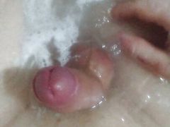 Playing with my cock in hot tub.