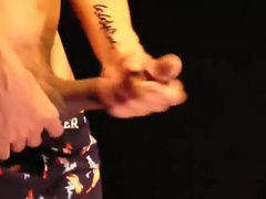 Stroking his huge cock and shooting a huge load