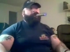 A Big Bellied, Cigar Chompin` Bear Strokin`