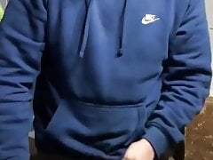scally boy pisses in a bottle