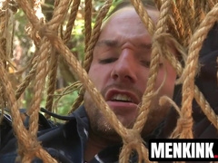 Officer Jimmy Bullet shown no mercy while restrained to a tree