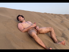 wank on a public beach