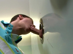 Appealing boys play glory hole oral games in fine scenes