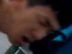 two asian guys having fun in the bathroom