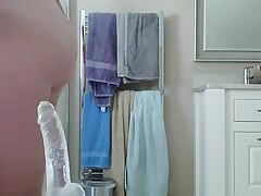 One small and one huge dildo in action