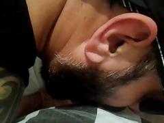 Bearded gay guy gets a load of cum all over his face