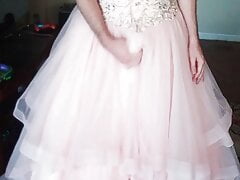 Wearing and enjoying a gorgeous pink quinceanera gown