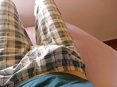 Twink cute boy throbbing dick under his plaid trousers pajama