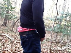 Public wanking in the woods, sagging, jerking and cumming. I jerk off in the woods and cum in my jeans