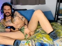 Long-haired gay Murfdog420 shows off his tattoos and enjoys a smoke