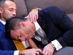Two men in suits are taking a break from their boring jobs