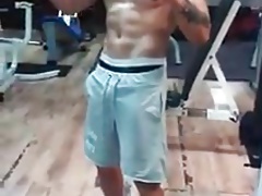 Bulgarian gay escort flexin in gym