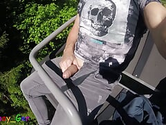 I jerk my hot cock from soft to hard in a moving chair lift. Public fun outside in the Bavarian Alps.