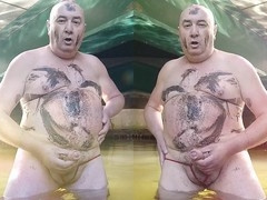 Chubby Euro gay Pascal masturbates to gay music outdoors in stocking and lingerie