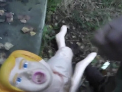 Randon Strait playing with rubber doll