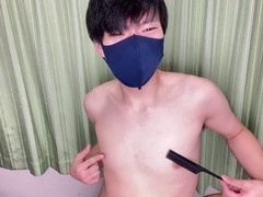 Japanese guy goes wild on the nipples with a comb and comes right away