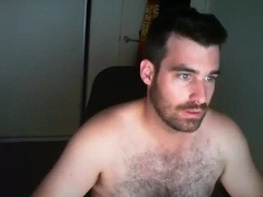 Handsome, hairy-chested, stocky guy-next-door masturbates...