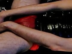 wank in lubed red swimwear