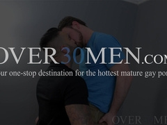 Rikk York plugs a sex toy and his cock into Scott Harbors rear