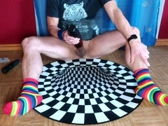 Colorful sock punk guy has fun with a massager and electric fleshlight