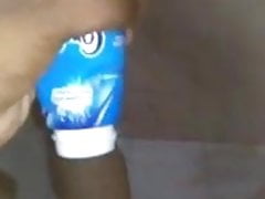 Desi boy inserting BBC into bottle